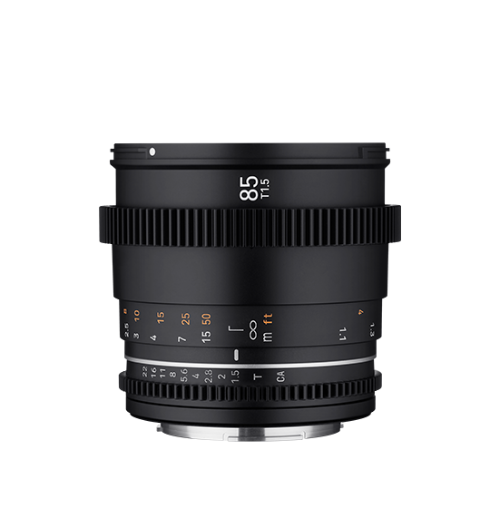 A black cinema lens with orange and white markings, shown from a side profile on a solid white background.