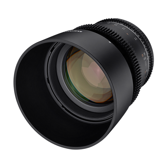 A Sony cinema camera lens with a black rubber lens hood, shown at an angle on a solid white background.