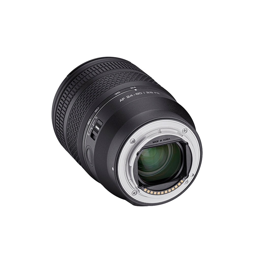 Camera lens 24-60mm / f2.8 FE with a mount view on a white background